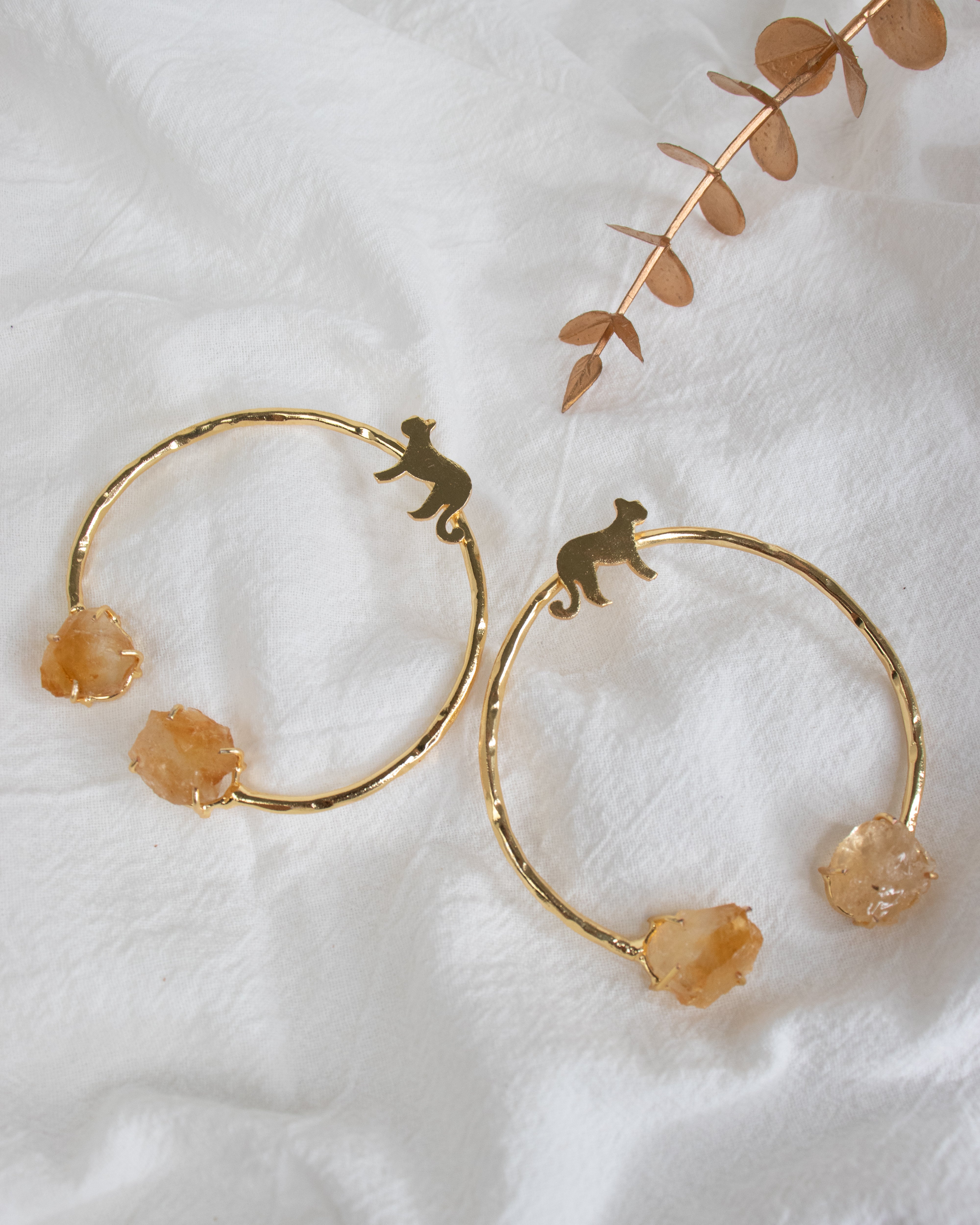 These Harmony Drops are the perfect choice! Measuring at 2.5 inches in both drop and width, these earrings are made of brass and feature stunning semi-precious stones. Add a touch of elegance to any outfit with these beauties. Our Contemporary Collections feature high-quality brass materials and are adorned with beautiful semi precious stones such as baroque, mop, citrine, quartz, and amethyst.