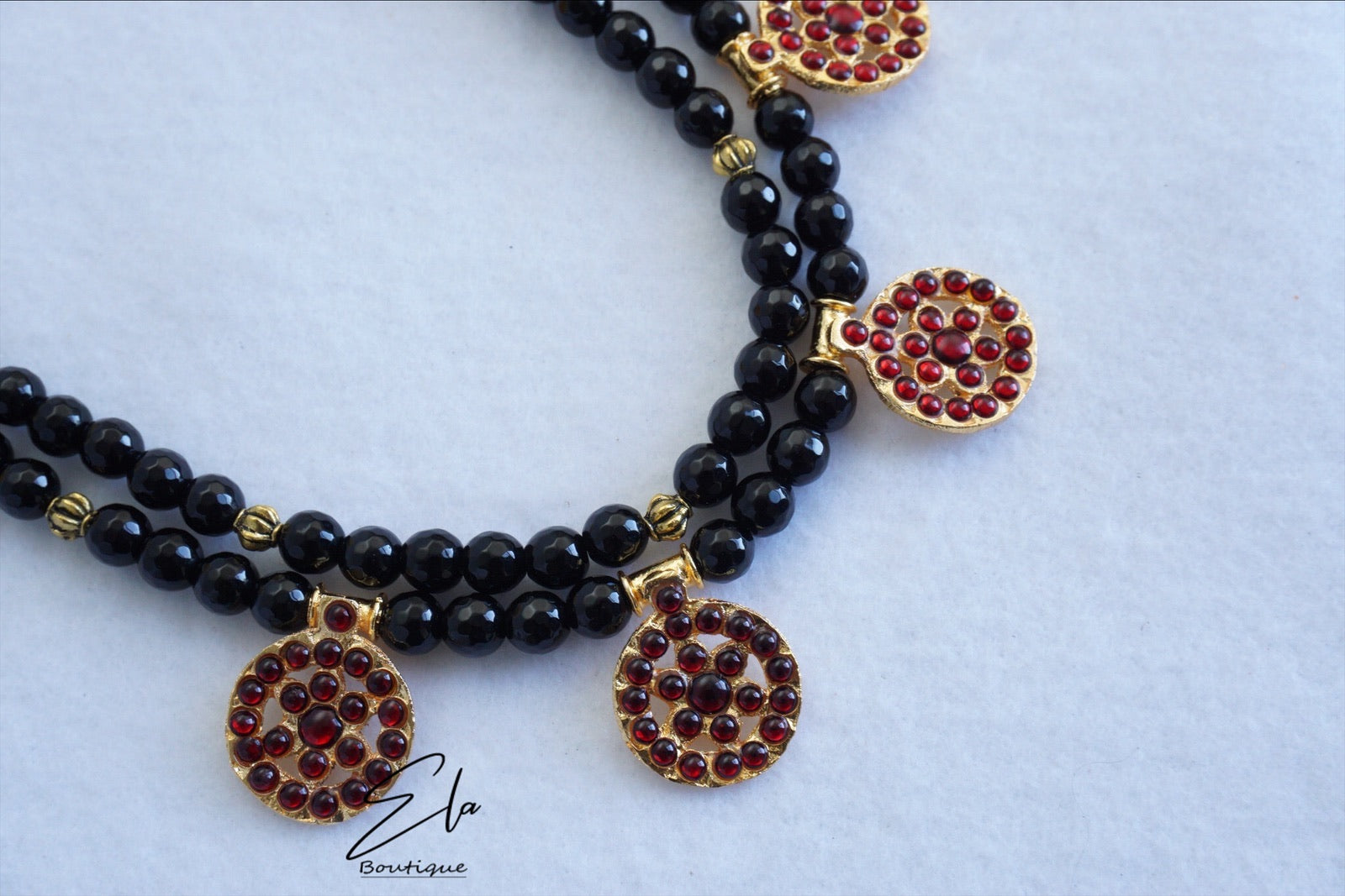 Traditional Kemp Neckwear with Black Beads.