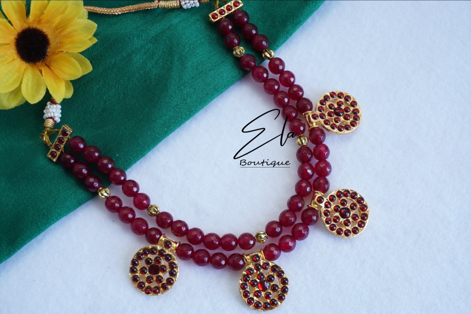 Traditional Kemp Neckwear with Red Beads.